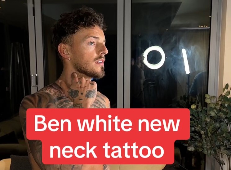 Arsenal’s Ben White, sidelined for three months, got two new neck tattoos, sparking fan jokes about his playing time. He’s now back in training for a return soon.