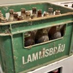 A 47-year-old beer crate is returned to a Bavarian brewery after being found in a barn. Brewery plans to display the historic crate as a tribute to its legacy.