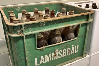 A 47-year-old beer crate is returned to a Bavarian brewery after being found in a barn. Brewery plans to display the historic crate as a tribute to its legacy.