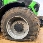 Jeremy Clarkson faces a £4,000 bill after his flashy Deutz-Fahr tractor gets a flat tyre at Diddly Squat Farm - and fans have hilarious reactions to the pricey mishap!