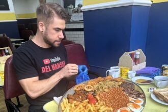 Canadian Joel Hansen shattered Pete Doherty's 2018 mega breakfast record, finishing in just 12 minutes - then ate a second plate in 15 minutes, making history at Margate's Dalby Café.