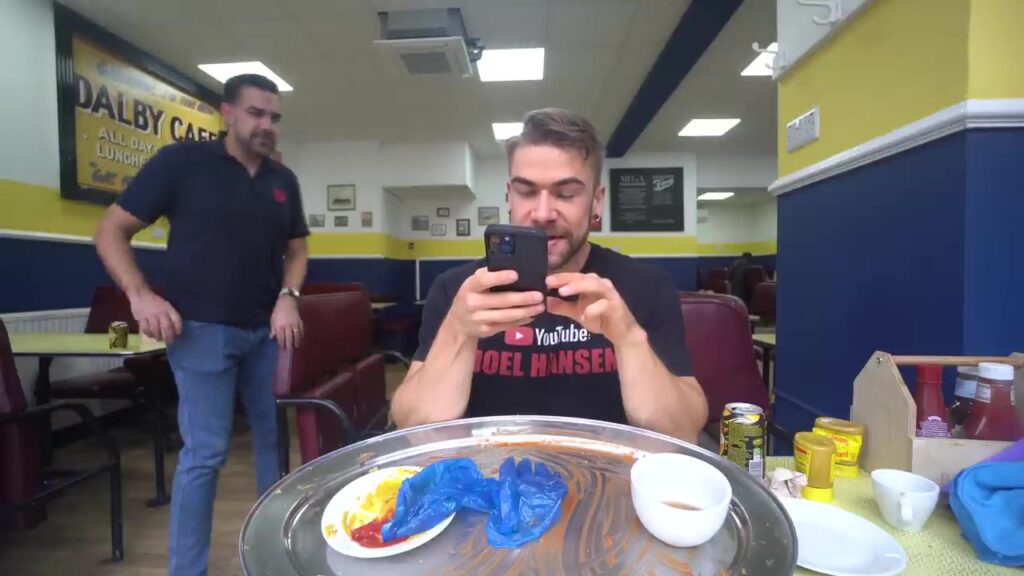 Canadian Joel Hansen shattered Pete Doherty's 2018 mega breakfast record, finishing in just 12 minutes - then ate a second plate in 15 minutes, making history at Margate's Dalby Café.