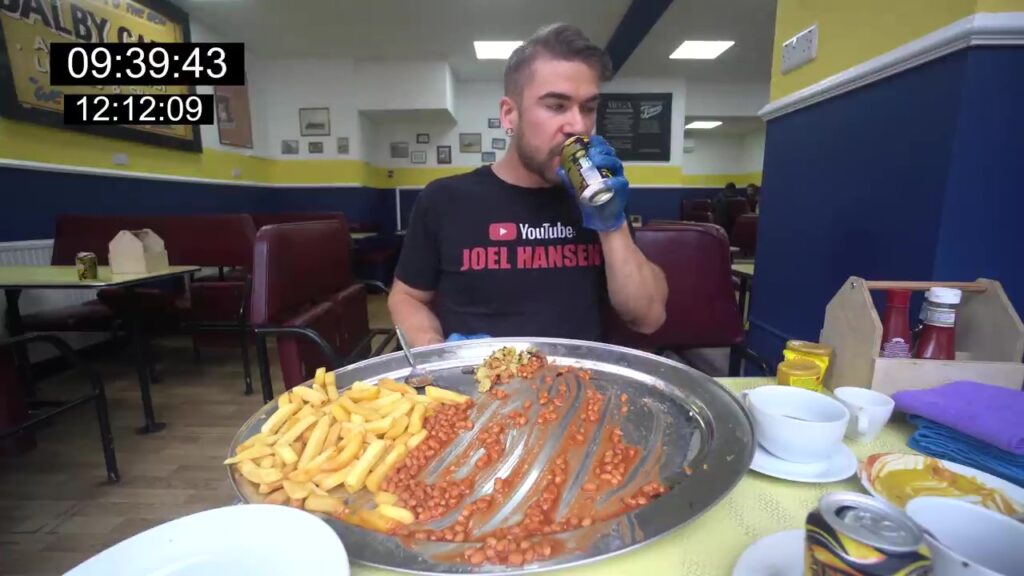 Canadian Joel Hansen shattered Pete Doherty's 2018 mega breakfast record, finishing in just 12 minutes - then ate a second plate in 15 minutes, making history at Margate's Dalby Café.