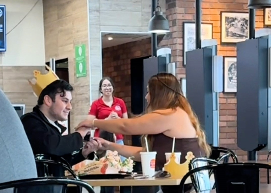 A man proposed to his girlfriend at a Burger King, but she closed the ring box, apologized, and walked out. The viral video captured the heartbreaking Valentine's Day moment.