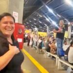 A devoted husband surprised his wife at a busy bus station on their anniversary, declaring his love in front of commuters before sharing a heartfelt embrace and kiss.