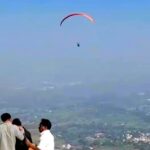 Student paraglides over traffic to make it to his exam on time - quick thinking and a daring flight help him avoid congestion and impress locals with his effort.