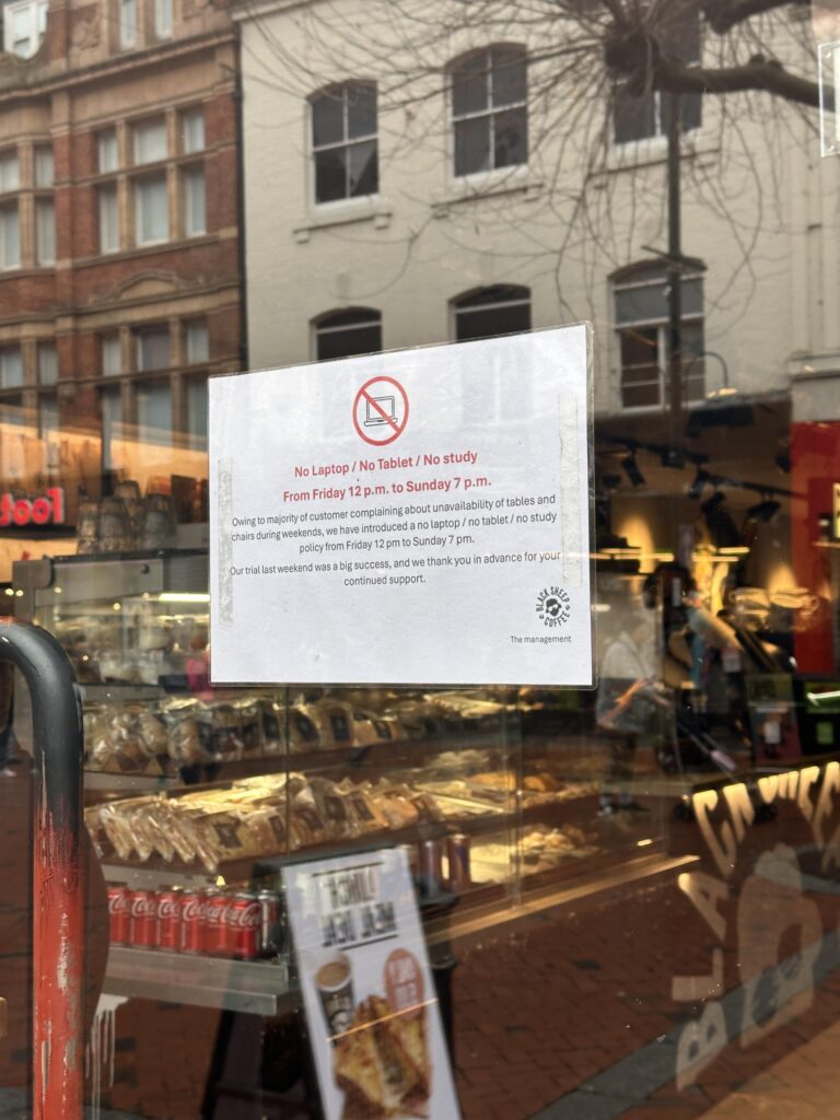 Black Sheep Coffee in Reading bans students from studying on weekends after complaints about table availability. The decision sparks mixed reactions online.