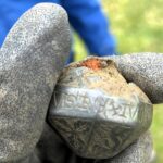 Schoolboy Lucas Cunliffe discovered a rare 13th-century sword pommel with his metal detector in northern England. The relic, linked to the Scottish Wars of Independence, is now under expert analysis.