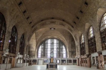 An explorer uncovers Buffalo Central Terminal - an abandoned train station frozen in time. Once a bustling hub, efforts are now underway to restore its historic grandeur.