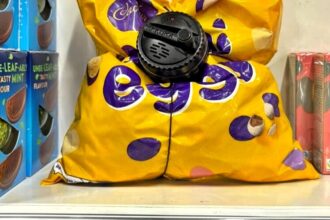 WHSmith has added security tags to £19 Cadbury Mini Eggs to deter shoplifters, leaving shoppers baffled. The move follows a rise in theft amid the cost-of-living crisis.