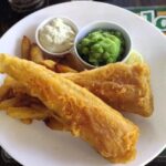 Witherspoons in Pattaya, Thailand, offers Brits a taste of home with fish and chips for just £4.58 - cheaper than a UK pint. The budget-friendly pub is a hit abroad.