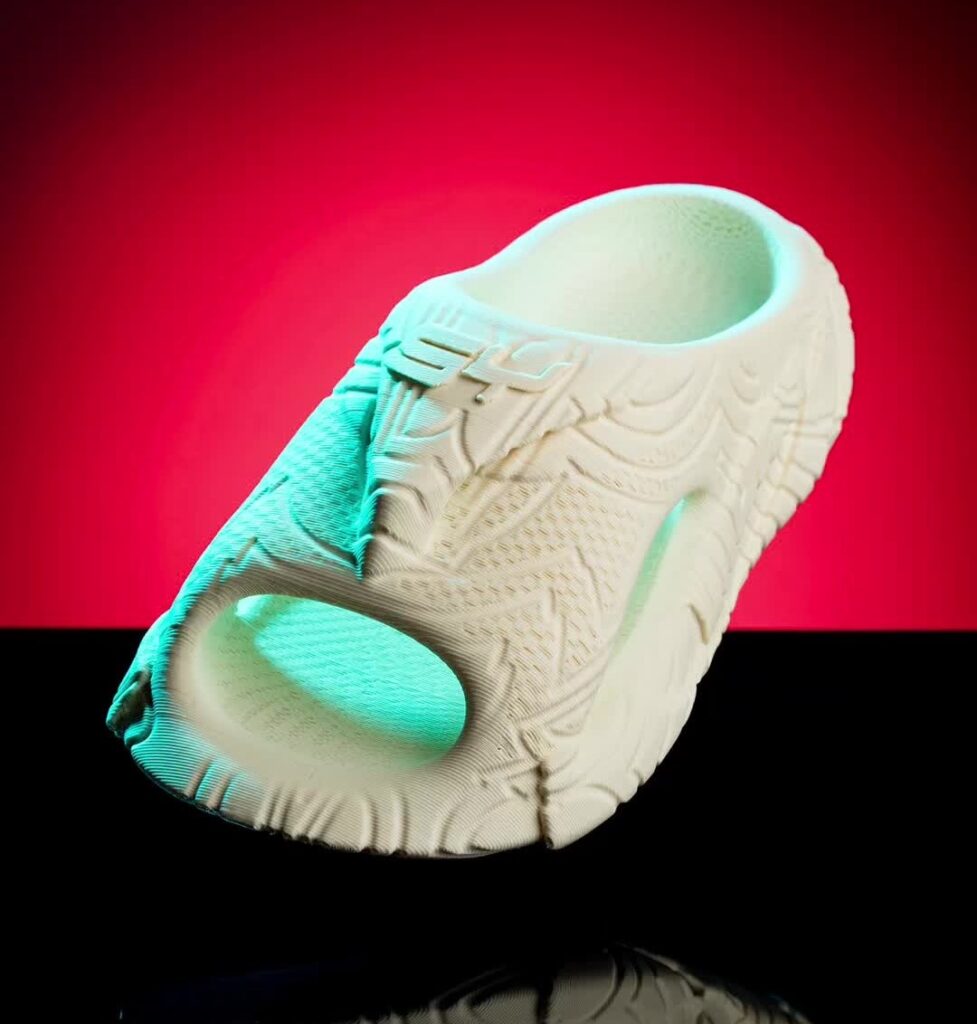 A startup has unveiled AI-designed, 3D-printed shoes resembling Crocs, promising a faster market turnaround and full recyclability, but at a premium price of $149.99.