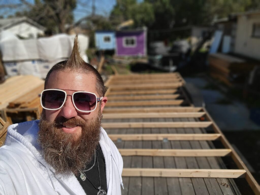 A California man is building tiny homes for the homeless at just £12,000 per unit, offering safe shelters with kitchens, bedrooms, and electricity to those in need.