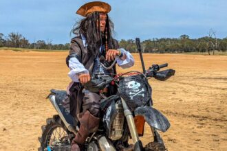 A French adventurer in Australia built a motorcycle that rides on water with no engineering experience, using makeshift materials and sheer determination to bring his vision to life.