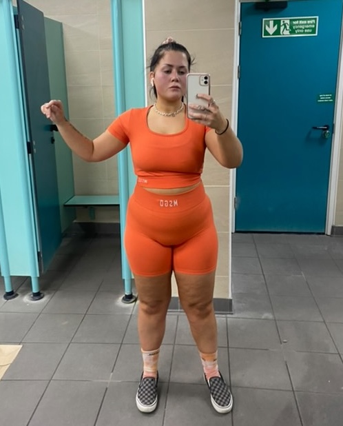 Woman who binge ate and avoided mirrors transforms her life - loses 38lbs, builds confidence, and becomes a fitness coach inspiring millions on TikTok.