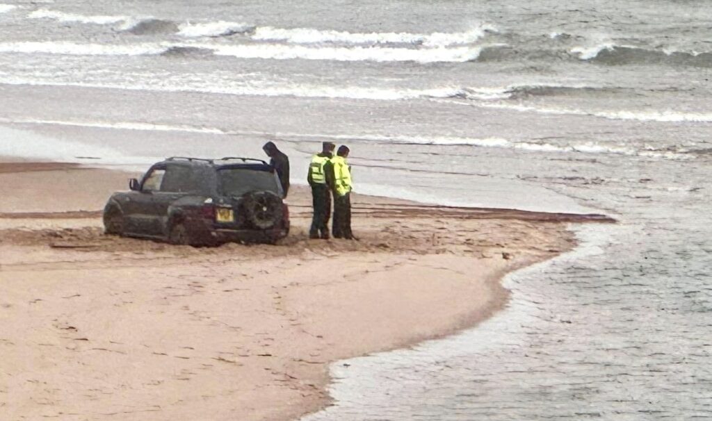 A driver has been slammed for getting their 4x4 stuck on Scotland's protected Lunan Bay beach, where it was engulfed by the tide, sparking outrage from locals.