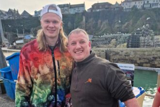 Erling Haaland surprised locals in Newquay, Cornwall, with a solo sea fishing trip after Man City's Champions League exit - catching a fish and making a quick exit!