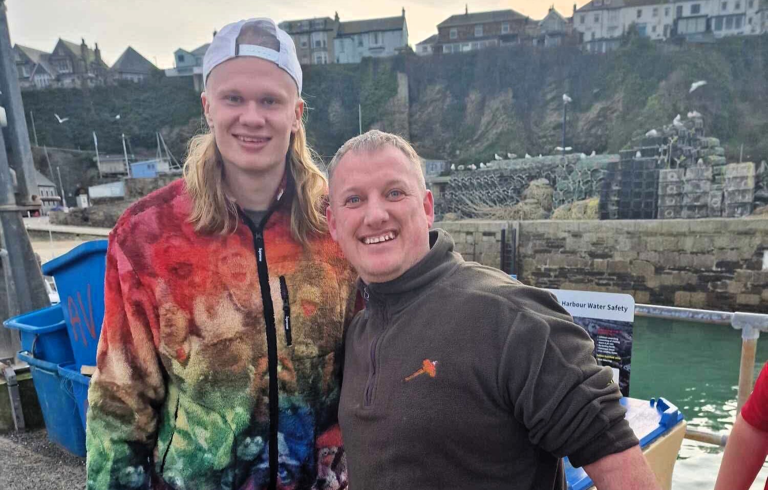 Erling Haaland surprised locals in Newquay, Cornwall, with a solo sea fishing trip after Man City's Champions League exit - catching a fish and making a quick exit!