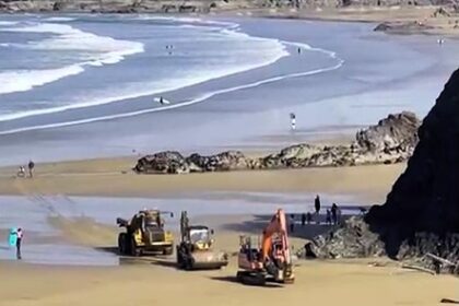 Sun-seekers at Towan Beach in Newquay had their first beach day of 2025 disrupted as construction vehicles rumbled across the sand, sparking frustration among locals.