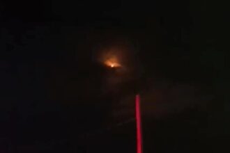 A glowing 'UFO' was spotted spinning in the sky over Barbate, Spain, before mysteriously disintegrating - leaving locals debating whether it was a spaceship in distress.