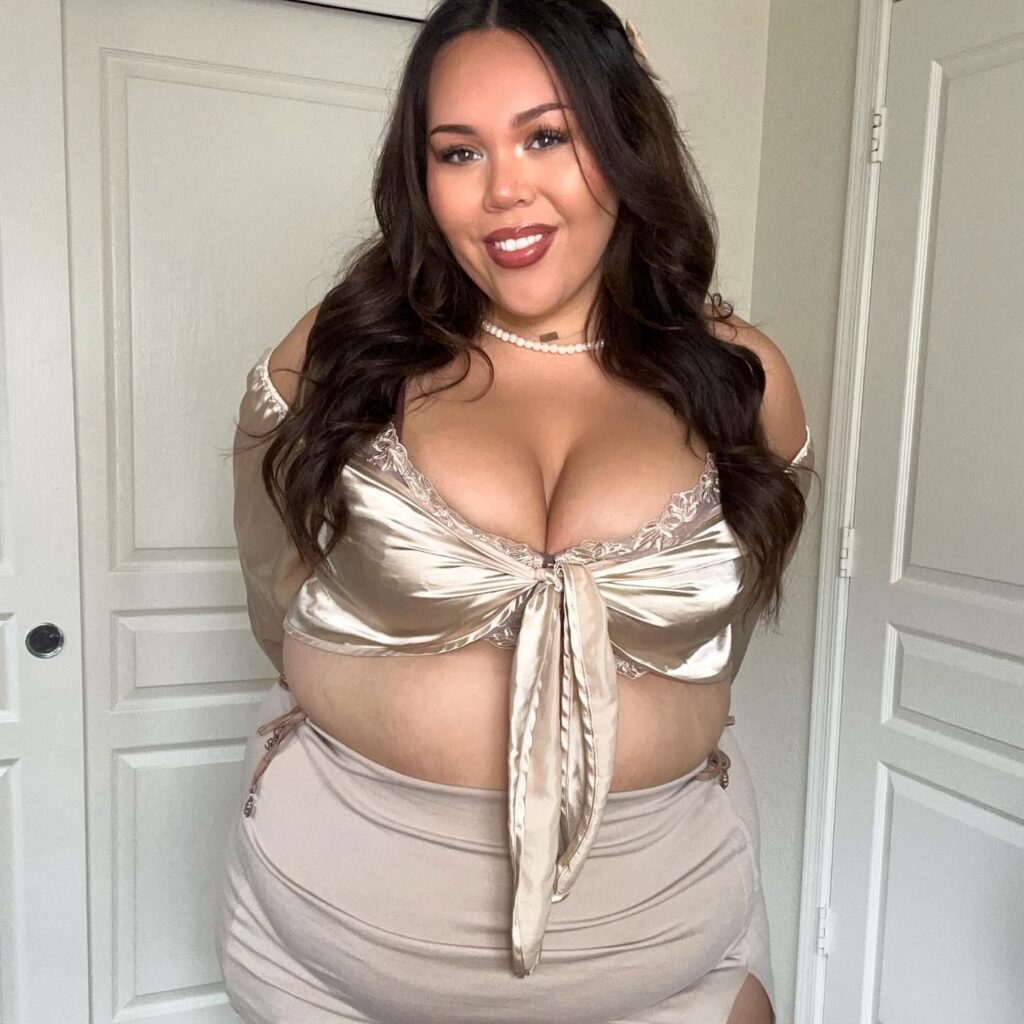 Plus-size influencer Julia Sena, once self-conscious in baggy jumpers, now embraces being "fat and proud," urging others to reject societal pressures and love their bodies.