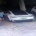 A mischievous nine-year-old crashed his neighbor's Porsche 911 into a wall after sneaking into the luxury car, causing £20,000 in damage - but the owner forgave him.