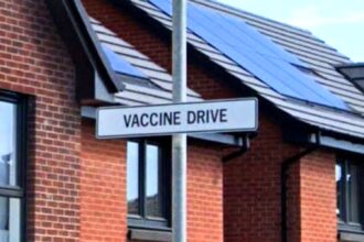 A new housing estate in Glasgow features bizarre medical-themed street names like Vaccine Drive and Virology Grove, reflecting its history as the former Ruchill Hospital site.