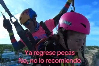 Tourist's paragliding adventure turns into a nightmare as she vomits mid-air, accidentally spraying her instructor - the viral video has left viewers in shock and laughter.