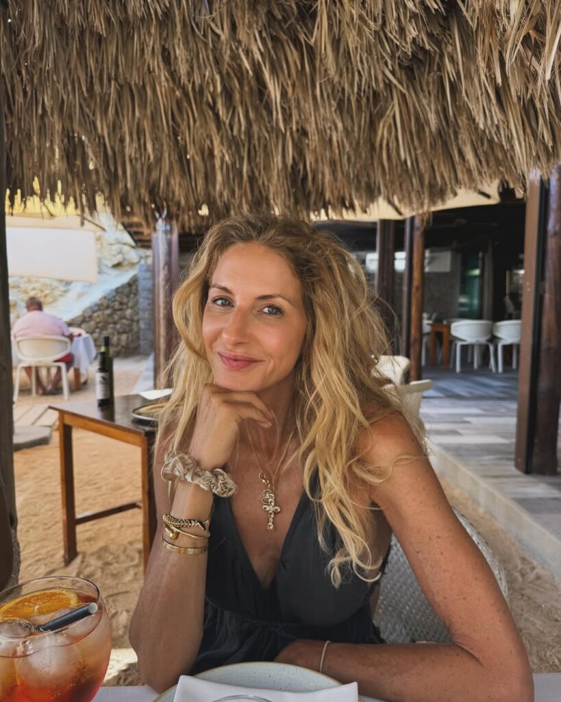 55-year-old Sue Griers reveals her six hacks for toned legs and a flat belly - leg lifts, cold showers, coffee scrubs and laughter - proving age is just a number.