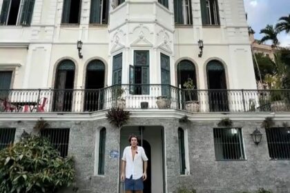 Man lives in Rio castle with Christ the Redeemer views for free - 25-year-old Dante Fiorani volunteers at part-hostel mansion, working 15 hours a week in exchange for luxury stay.