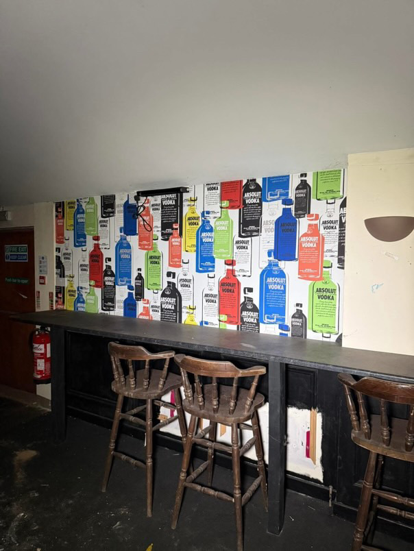 Urban explorer finds secret gambling rooms in abandoned Irish pub - from hidden doors to booze and vintage merch, it’s a haunting glimpse into a forgotten past.