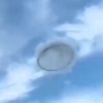 A stunning lenticular “UFO cloud” was spotted over Antarctica, forming near a mountain on King George Island and sparking awe with its saucer-like shape in the sky.