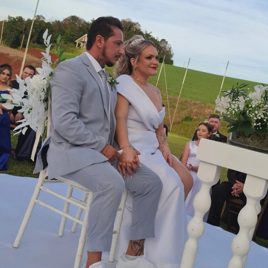 Bride who fell for undertaker attends funerals for two years to get noticed - finally weds him and arrives at ceremony in a hearse with 'Till death do us part' sign.
