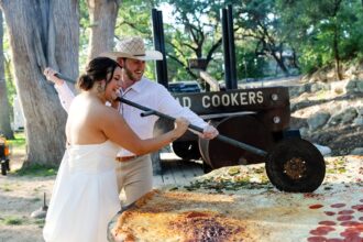 Pizza lovers Beth and Brandon Duhon served an 8ft pie and heart-shaped pizza at their wedding, turning their big day into a cheesy, unforgettable feast for 160 guests.