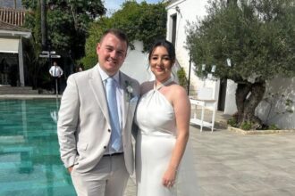 A couple stunned TikTok after discovering a nursery photo of them sitting side by side, seven years into their relationship and now expecting baby number two.