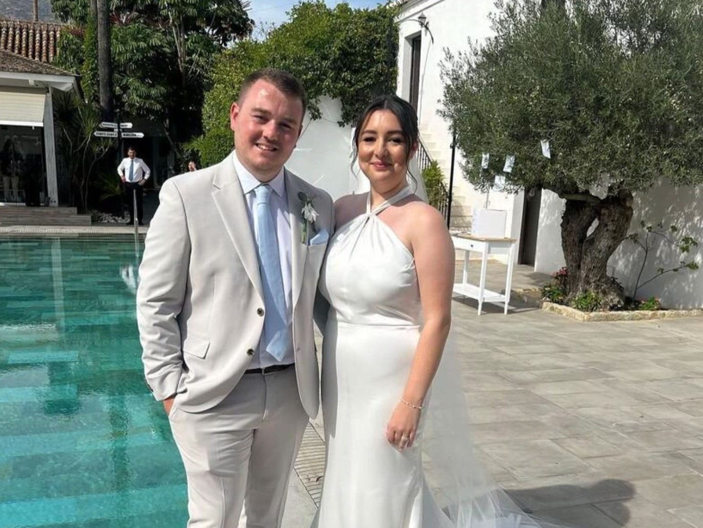 A couple stunned TikTok after discovering a nursery photo of them sitting side by side, seven years into their relationship and now expecting baby number two.