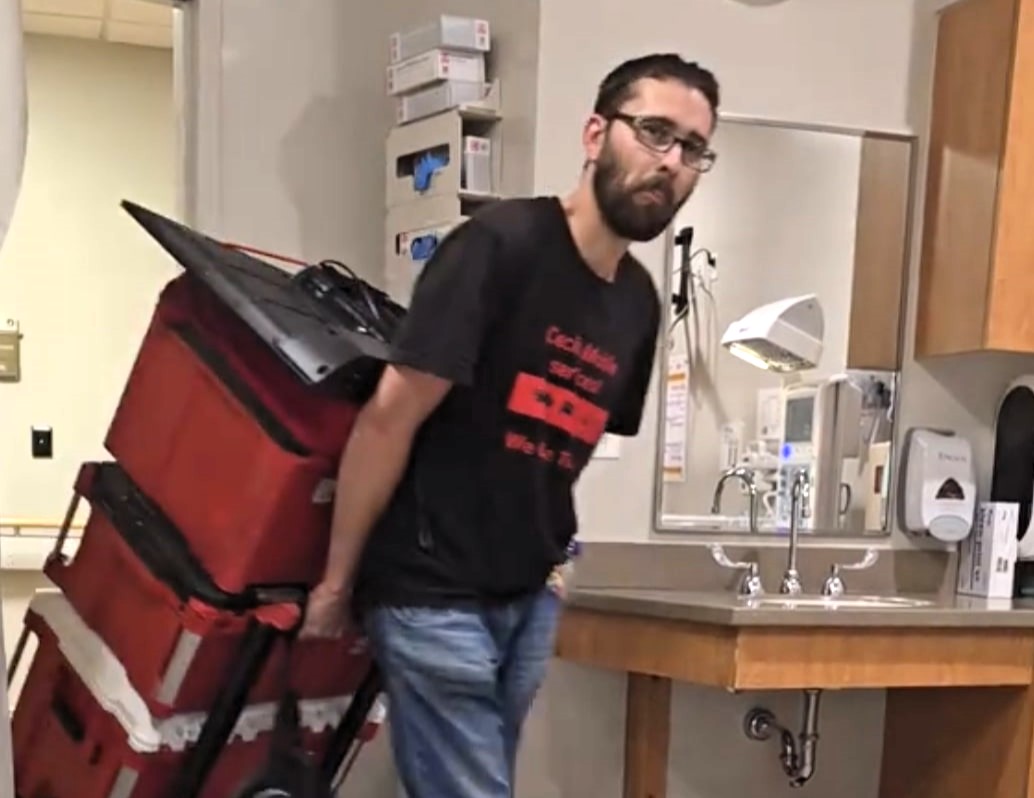 Dad-to-be brings TV and Xbox to hospital for birth, sparking backlash on TikTok - but partner reveals it was all to comfort her, not game, during labour stay.