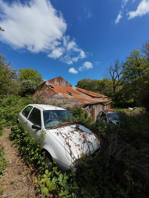 An abandoned house in Camelford, Cornwall, filled with brass belts and vintage decor, was found untouched since 2020, offering a haunting glimpse into a life left behind.