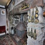 An abandoned house in Camelford, Cornwall, filled with brass belts and vintage decor, was found untouched since 2020, offering a haunting glimpse into a life left behind.