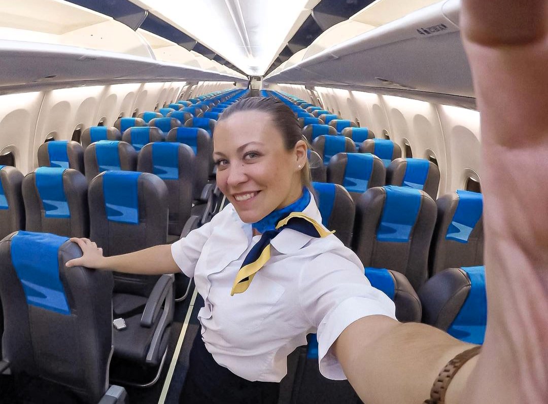 A flight attendant warns travelers not to wear heels, metal accessories or revealing outfits on planes, as they can delay evacuations or get you kicked off.
