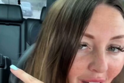 Medium Chloe Smith claims she saw the spirit of an elderly woman in glasses on her car’s back seat outside Tesco - fans say they spotted the ghost in her viral video too.