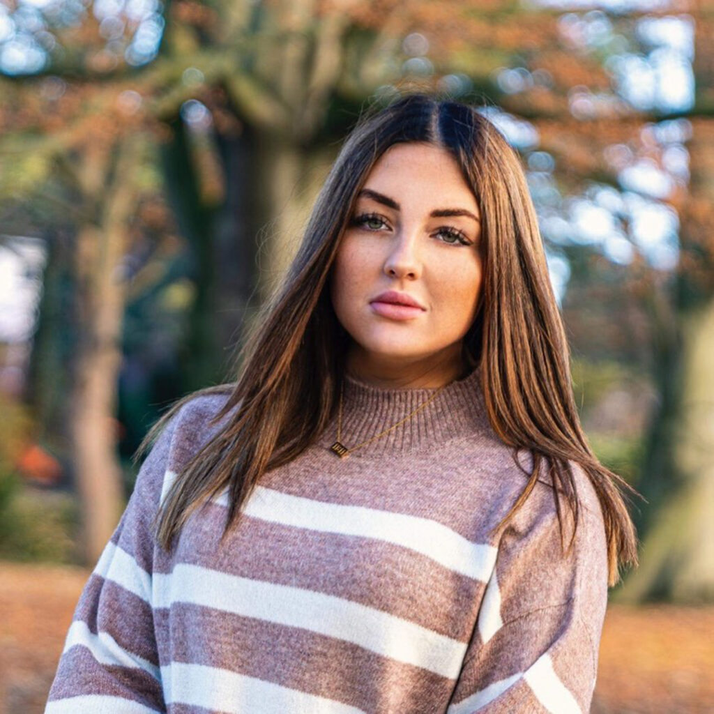 Medium Chloe Smith claims she saw the spirit of an elderly woman in glasses on her car’s back seat outside Tesco - fans say they spotted the ghost in her viral video too.