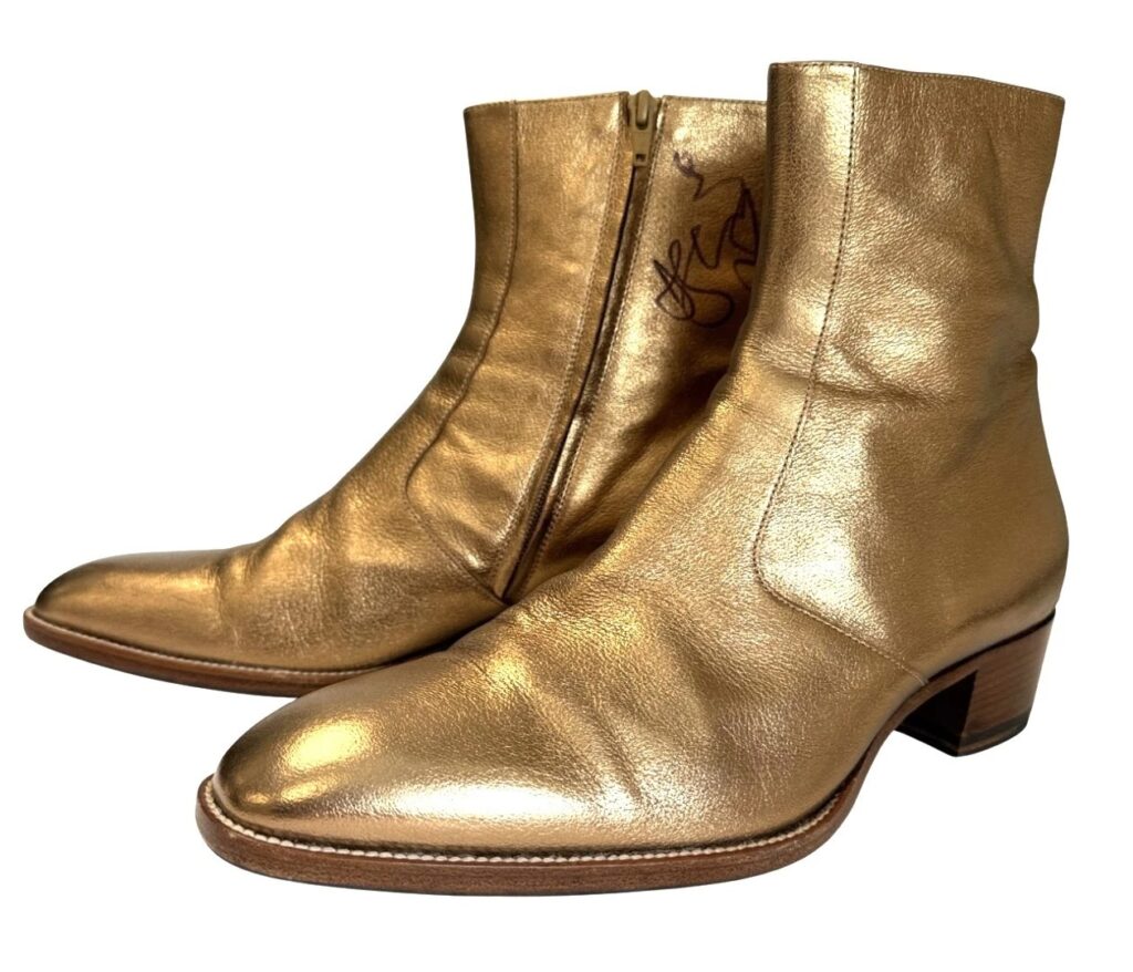 Depeche Mode’s Dave Gahan donates signed gold boots to British Heart Foundation - selling for £5,050 and becoming the charity’s top eBay item to fund heart research.
