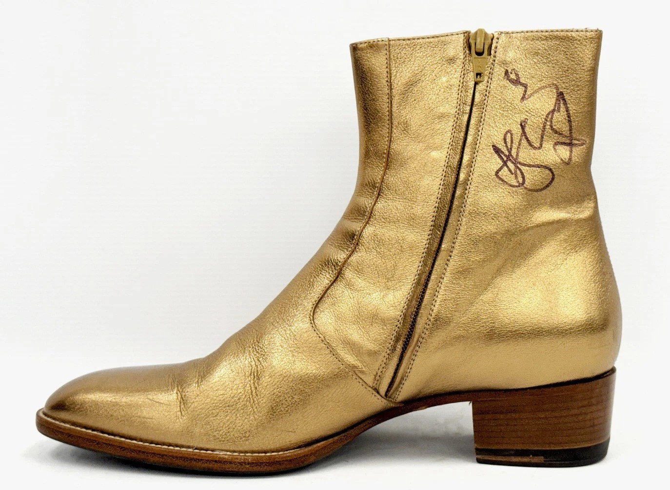Depeche Mode’s Dave Gahan donates signed gold boots to British Heart Foundation - selling for £5,050 and becoming the charity’s top eBay item to fund heart research.