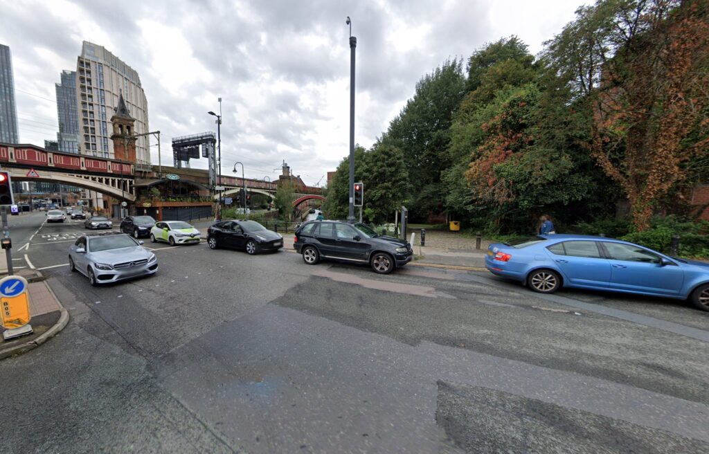 Seven geese were saved from a busy Manchester road thanks to quick-thinking pedestrians who stopped traffic and guided them safely to a nearby canal to applause.