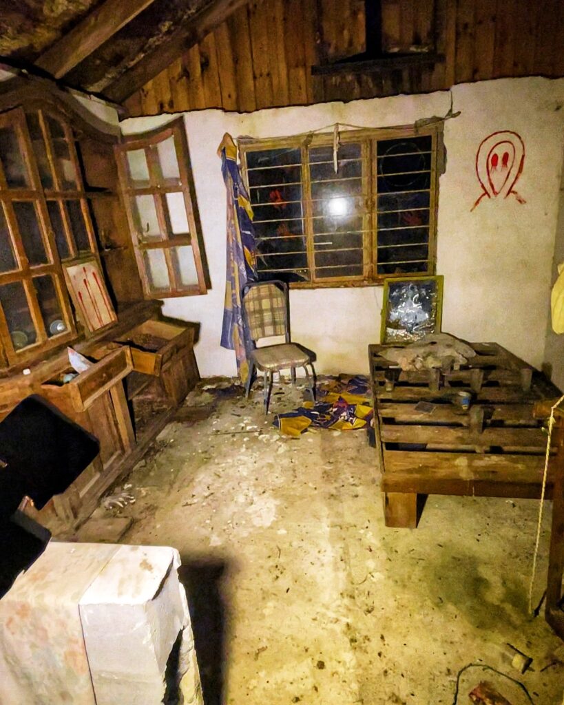 A TikToker exploring a haunted house in Mexico captured a ghostly figure with glowing red eyes on camera, leaving viewers terrified by the chilling encounter.