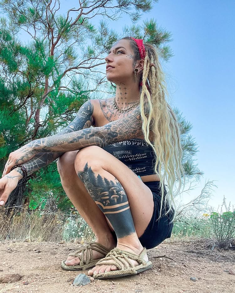 Body mod fan Flower relearned to speak after a painful tongue split, part of her £8.5k transformation including tattoos, piercings, and plans for ear pointing and fangs.