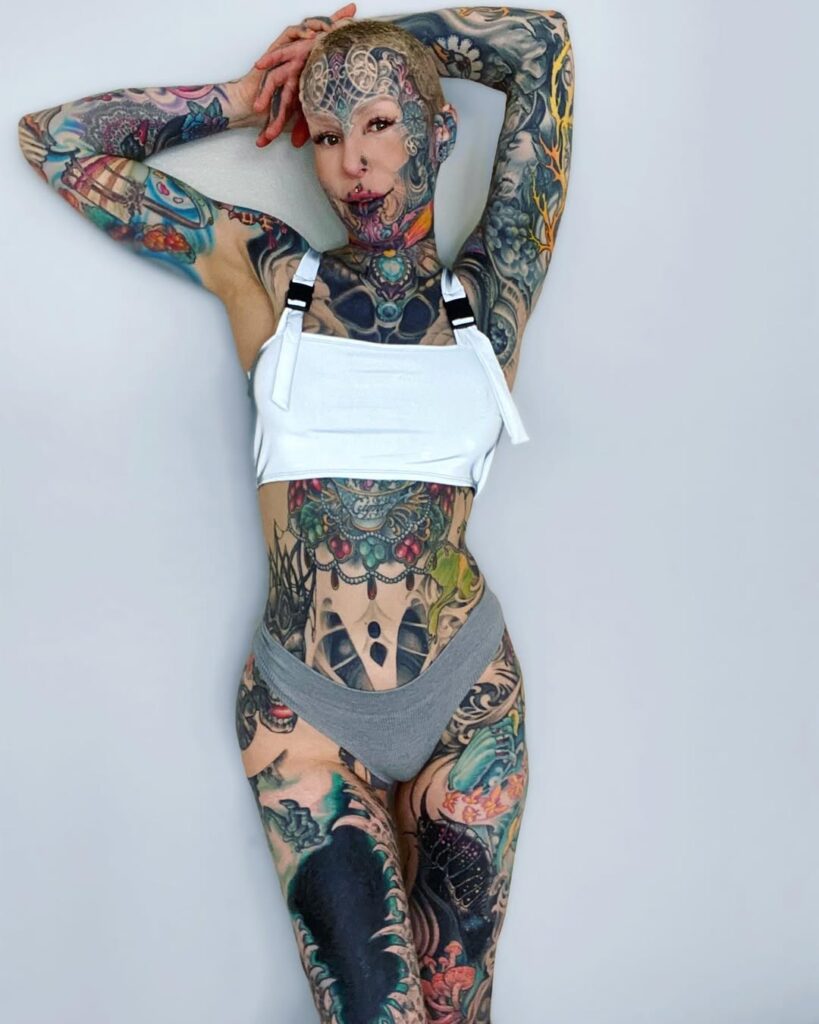 Tattooed influencer Cigno spent £156,000 transforming her body into a bold work of art, defying trolls and stereotypes to create her powerful and unforgettable look.
