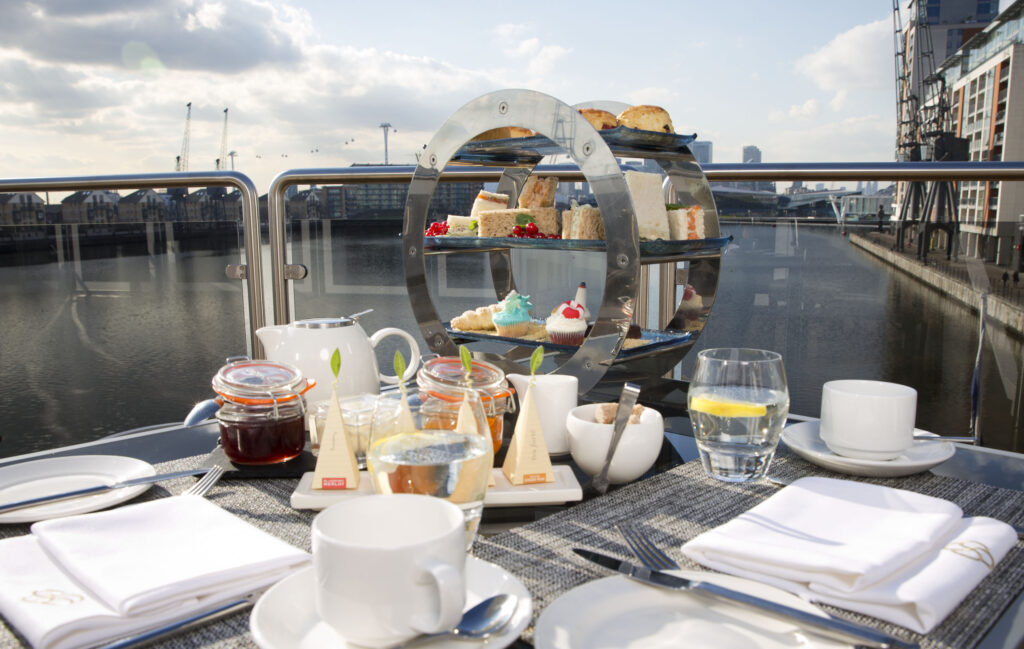 Stay aboard a superyacht hotel in London for just £122 a night - Sunborn offers luxury rooms, gourmet dining, and views of the O2 and City Airport from the dock.