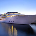 Stay aboard a superyacht hotel in London for just £122 a night - Sunborn offers luxury rooms, gourmet dining, and views of the O2 and City Airport from the dock.